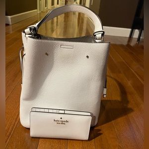 Kate Spade bucket purse with matching wallet.